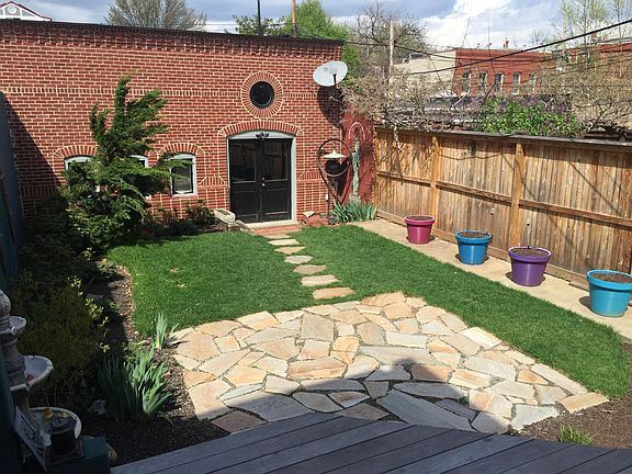 private backyard leading to garage