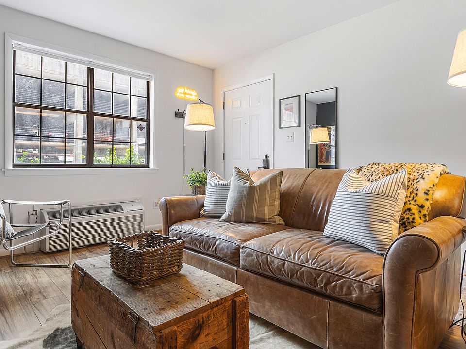 Cozy living room with a smart TV and a sleeper sofa. No stairs in this condo and located on the ground level, for easy access.