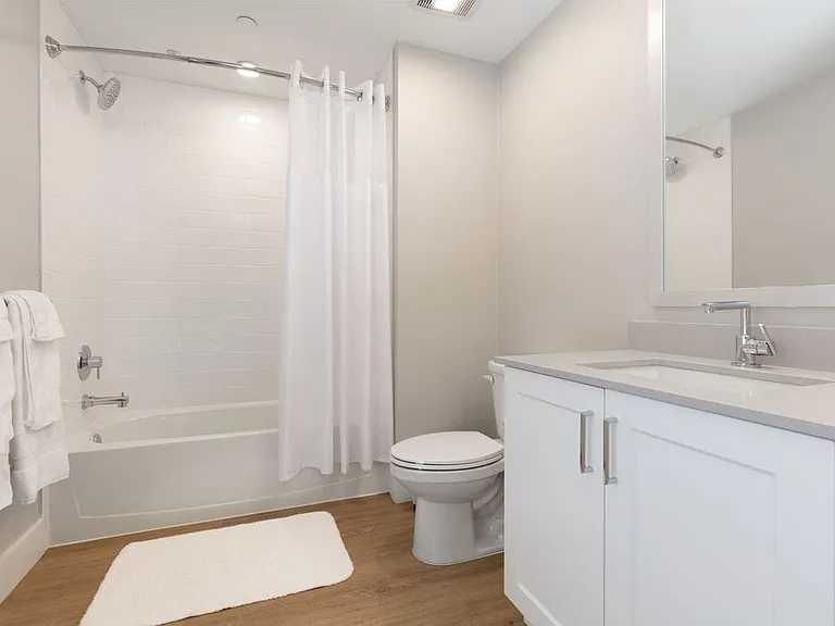 Finish Package I Bath with white cabinetry, grey quartz countertop, and hard surface flooring