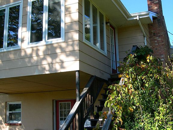 View of Southeast Corner of Home (Sunroom)