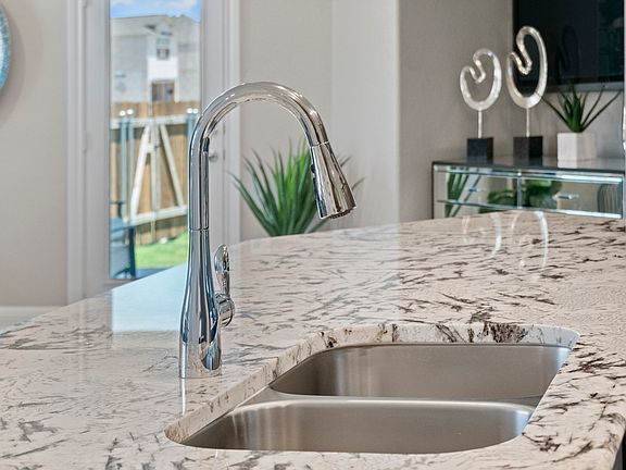 Double-basin stainless steel sink