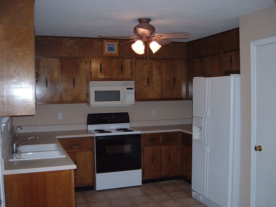 plenty of cabinets with new flooring and paint