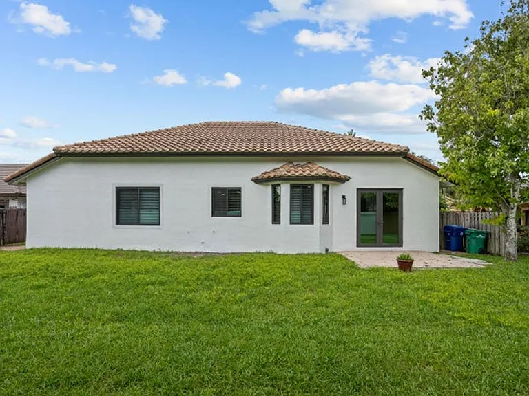 8985 NW 45th Ct — Photo 14