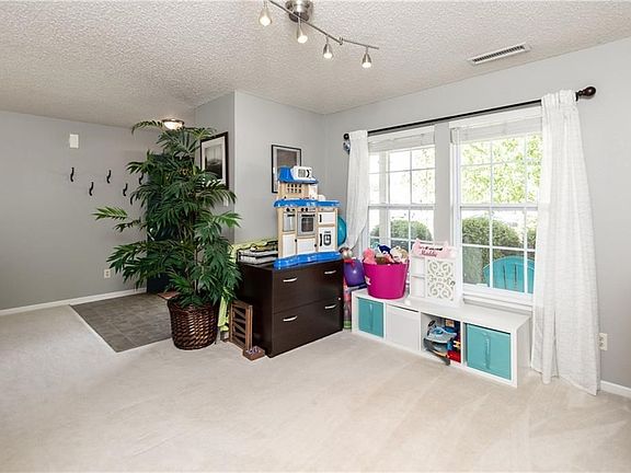 First floor bonus room.. den, office, playroom, formal dining room