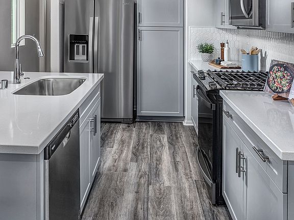 Residence 2 interior image modeled at a nearby Meritage community.