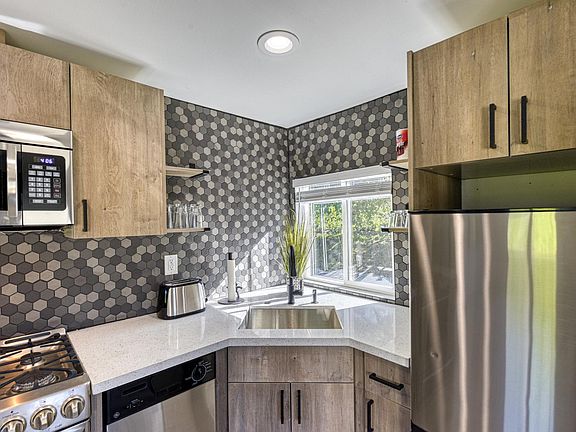 Nice kitchen with full utensils and cookware