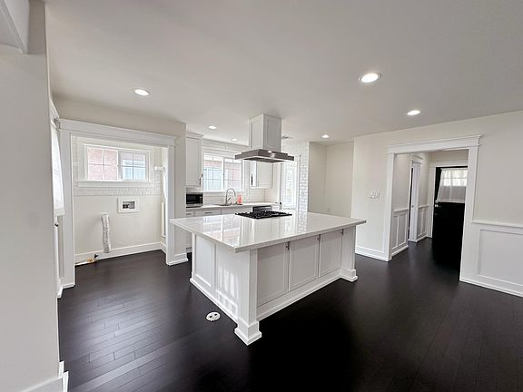 Open concept kitchen, living room, dining space