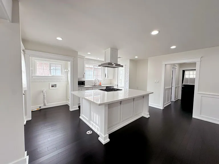 Open concept kitchen, living room, dining space