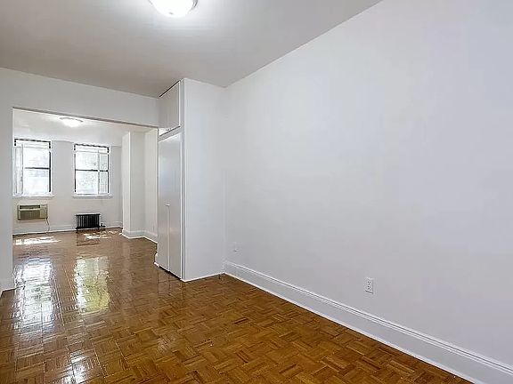 3rd image of 209 E 4th St APT A