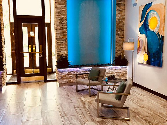 Lobby area with 24 hour door man service. Secured entry.