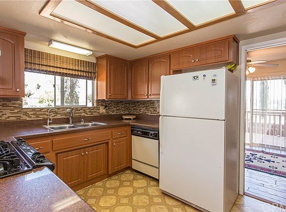 Updated kitchen cabinets and counters.
