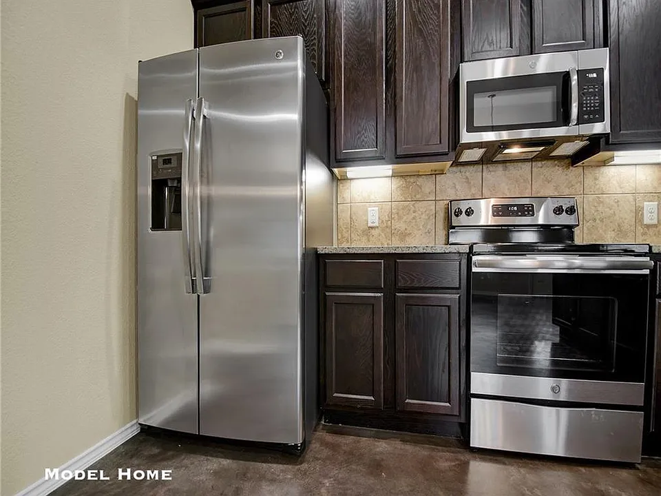 LIKE PICTURE - of range and microwave. Fridge is not a side by side