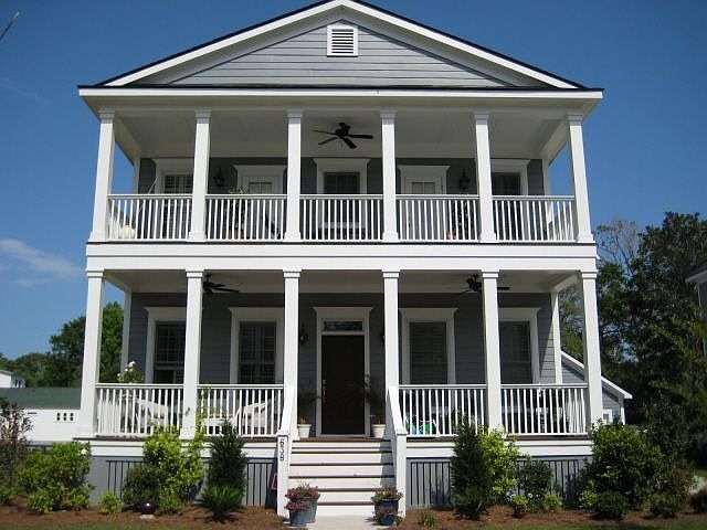 Front of home with huge porches