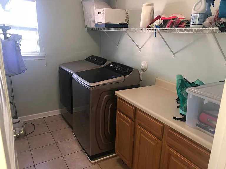 New Washer-Dryer purchased in 2022! Large laundry room.