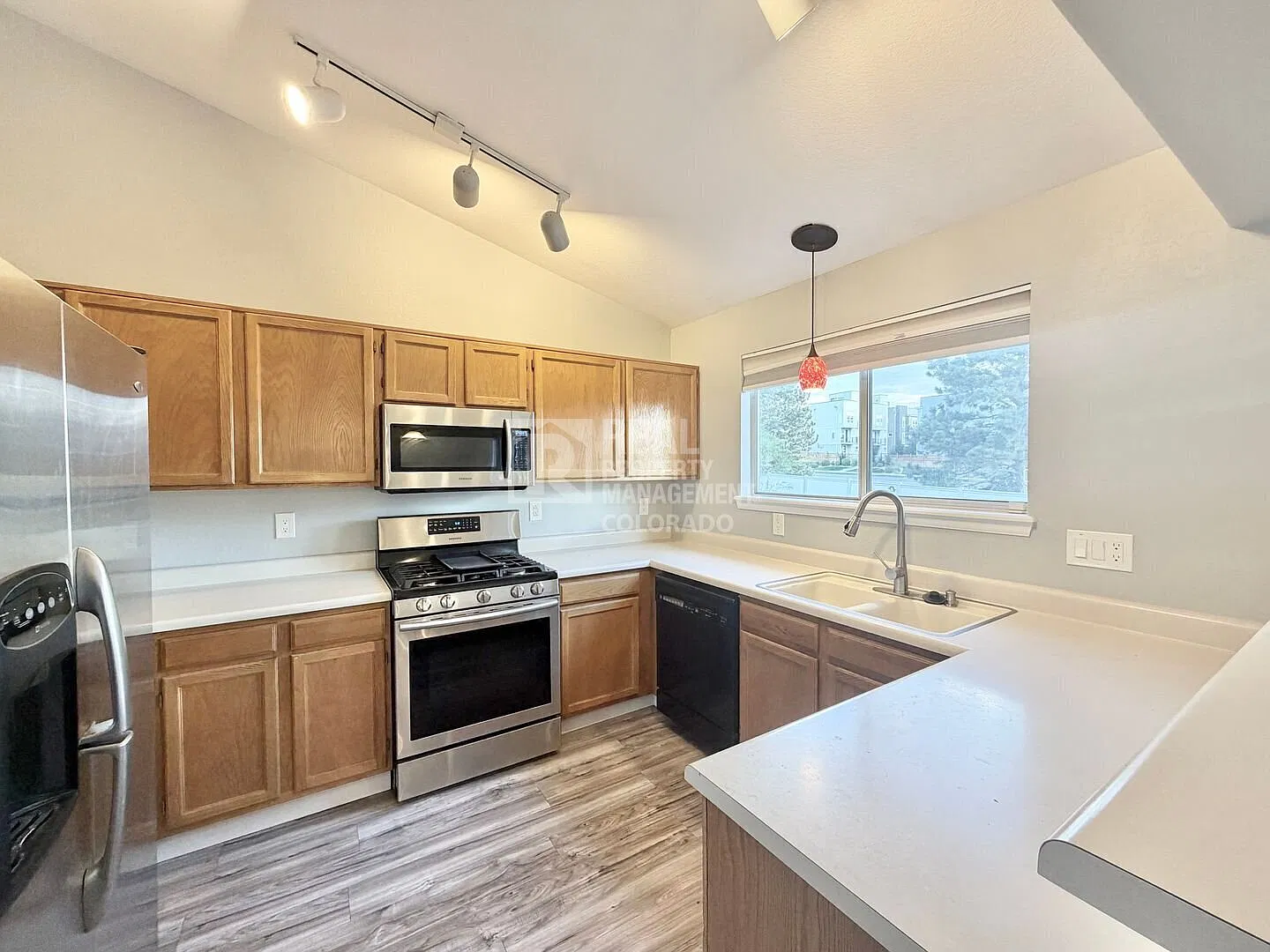 Spacious 4-Bedroom Home with Fenced Yard & 2-Car Garage — Photo 4