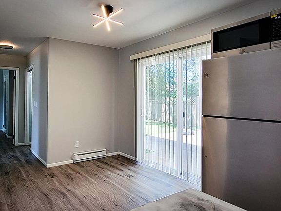 Walk out to small patio and shared backyard