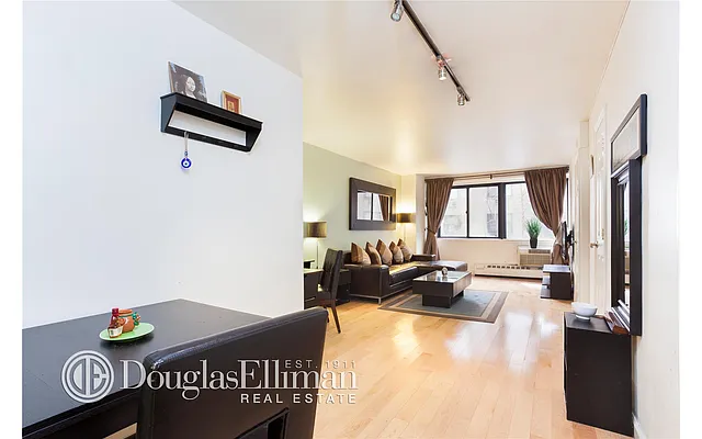 Sold by Douglas Elliman | media 18