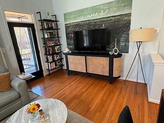 Hard wood floors throughout the apartment and sky high living room ceilings.