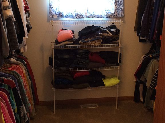 Spacious walk in closet.