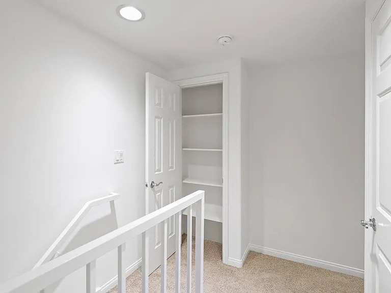Second-Story with Hall Closet with Built-In Shelving