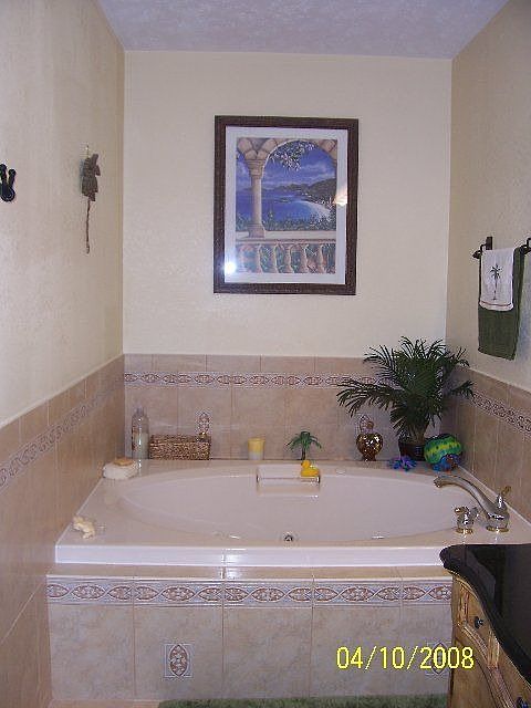 bahtroom remodel complete- jacuzzi tub where old closet was
