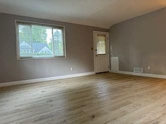 Entrance into living room - new floor and paint.