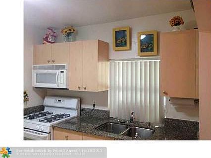 5th image of 9661 NW 25th Ct