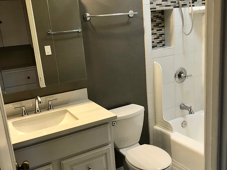 New sink, counter top and faucet.