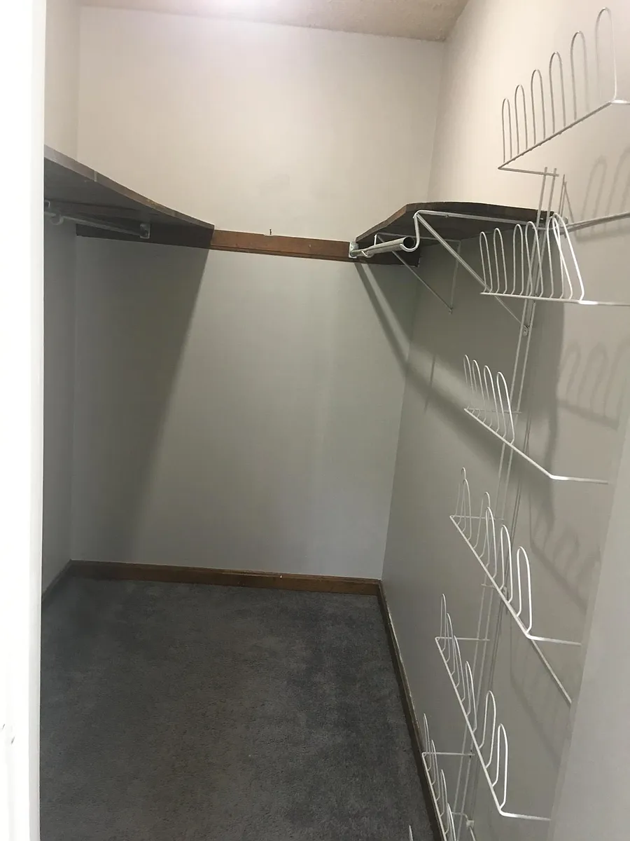 Walk-in closet off master bedroom. - 916 Potters Ln