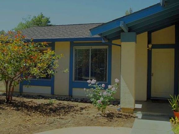 Front of house with rose