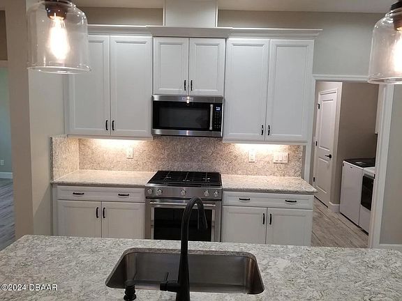 4th image of 493 Margaritaville Ave