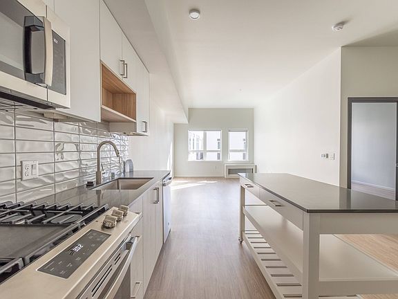 Find an unparalleled sense of style at Modera River Trail. Some homes feature moveable kitchen islands like this one. All homes feature gas ranges and thoughtful, open floor plans.