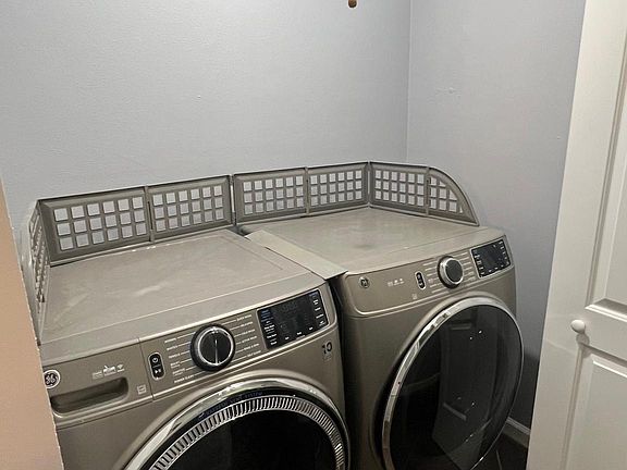 Washer and dryer closet in hallway