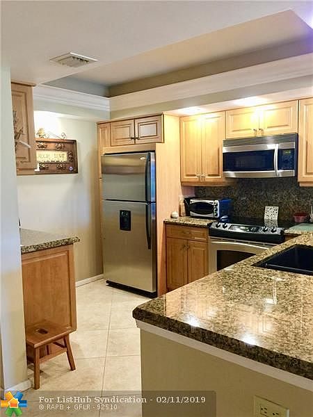 1st image of 2950 N Palm Aire Dr APT 201