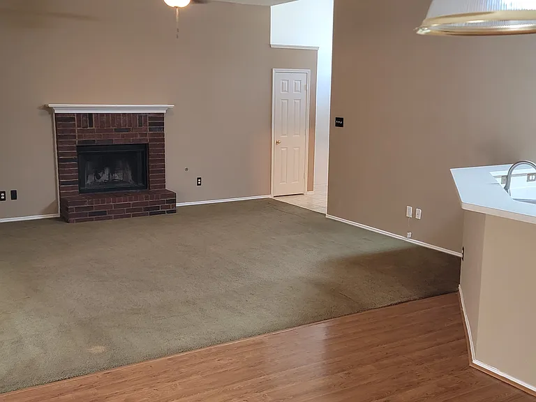 Breakfast nook looking into living room/kitchen