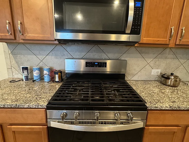 Gas stove included. Beautiful counter tops and plenty of cabinets.