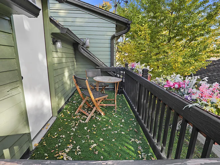 2nd level porch that gets morning sun and afternoon shade. This is located off the bedrooms.