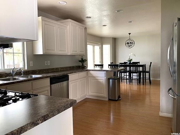 Gas range included. This is the view when walking in from the garage door.