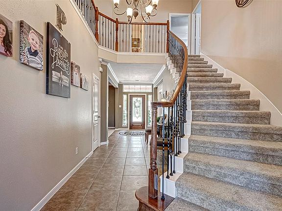 Let the memories begin with the first step! Check out your breathtaking staircase with wrought iron spindles.