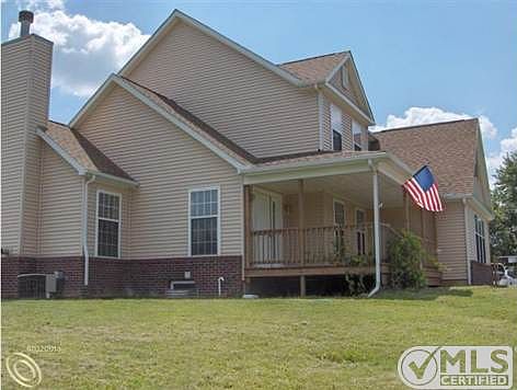 SIDE OF HOUSE/FRONT PORCH