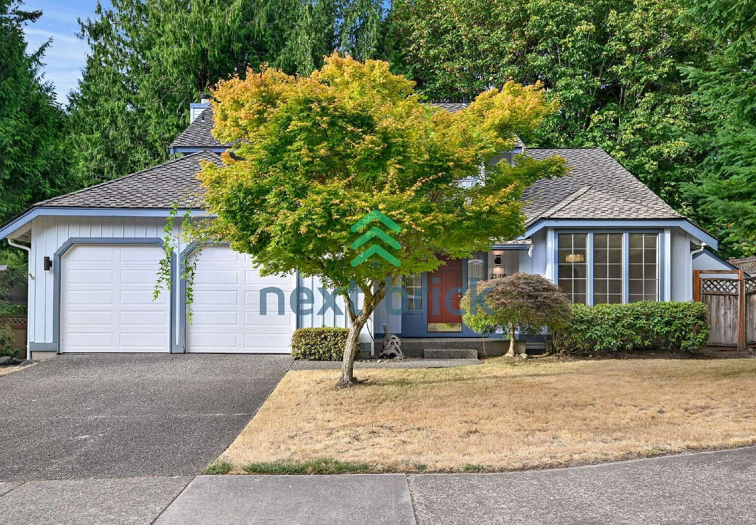 "Spacious 4-Bedroom Retreat with 2.5 Baths in Charming Sammamish Setting" — Photo 1
