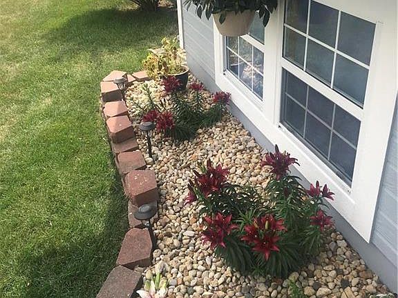 Landscaping in front of the house.