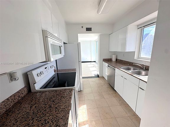5th image of 5900 Collins Ave APT 906
