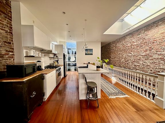 View of kitchen from dining/seating area.