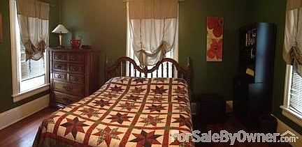 Upstairs bedroom
						:
						Spacious bedroom has nice walk in closet. Hardwood floors throughout the home