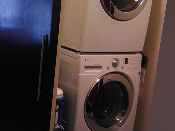 Laundry room with extra storage and washer & dryer