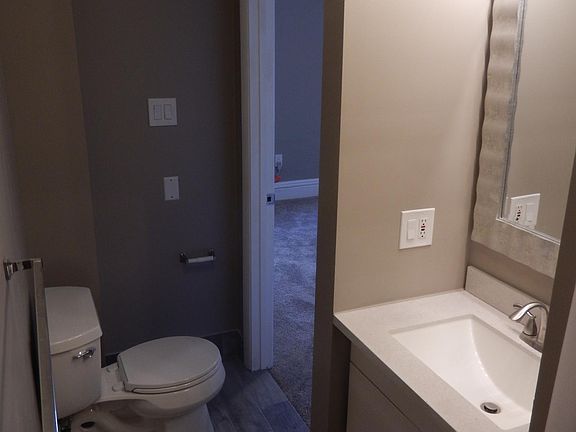 Bathroom within Bedroom #1, New sink, toilet, floor