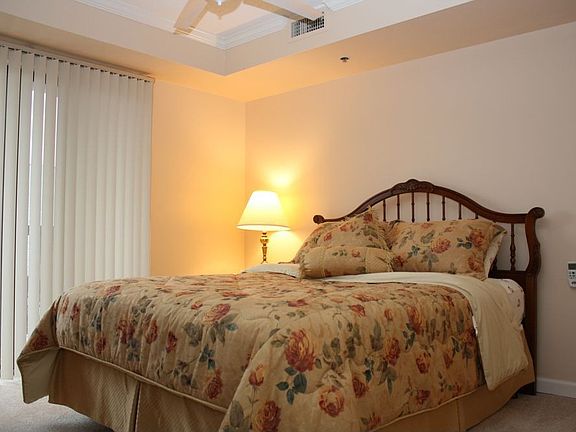 Master Bedroom w/Ceiling Fan. There is Brand New Carpet Throughout The Unit