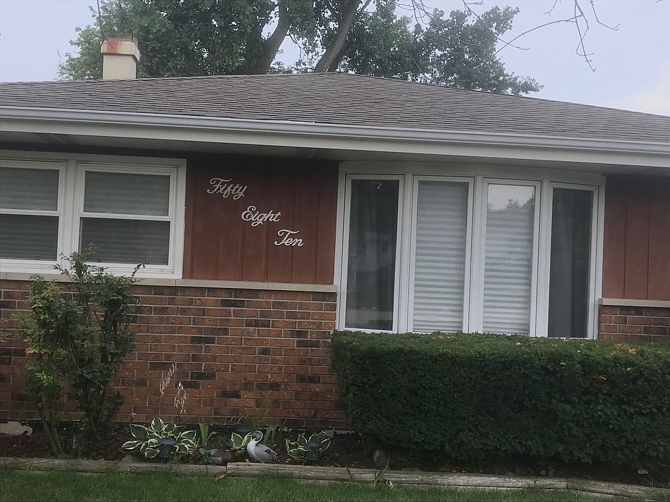Front of split level home. updated siding.