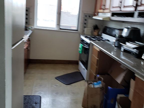 Spacious kitchen, granite counter tops, large windows, many cabinets space